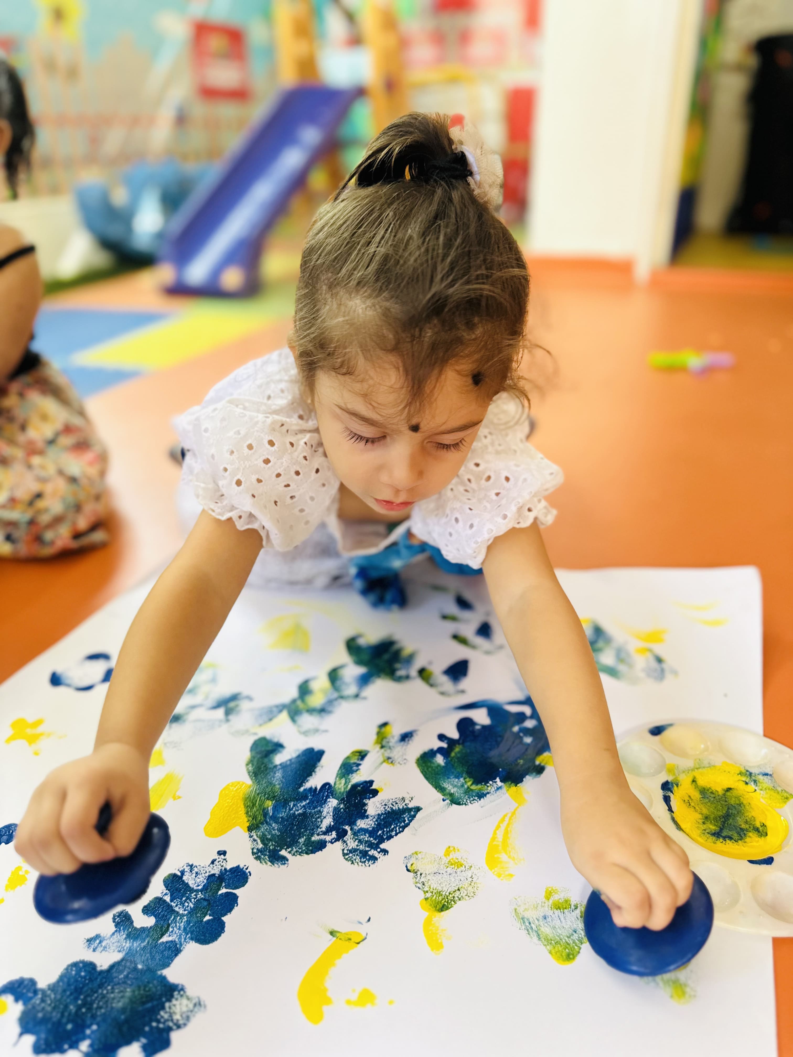 Toddlers playing in the premium playgroup classroom at Kings Court World School Jaipur